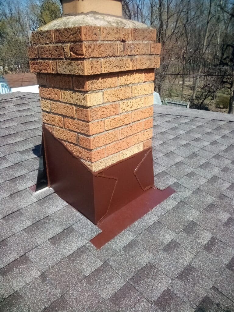 architectural vs. 3-tab shingles Fresh shingles around a chimney