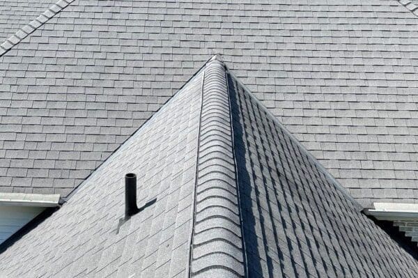 Light gray asphalt roofing shingles installed by a roofing contractor in Avon Lake