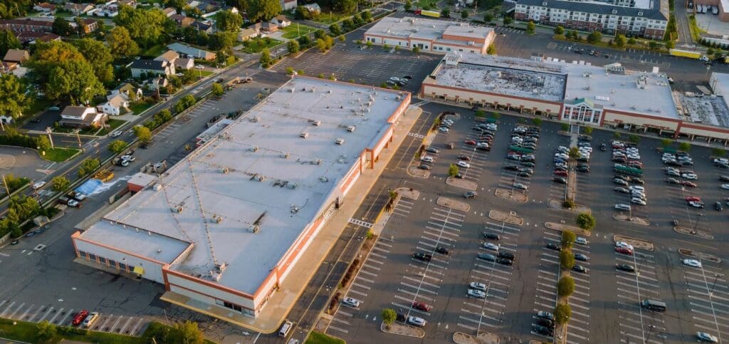 Commercial building that needs roof restoration coating services.