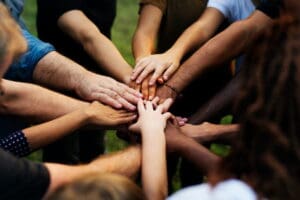 People Together Joining Hands as a Team