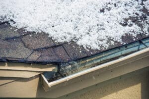 Discover how clogged gutters can destroy your roof