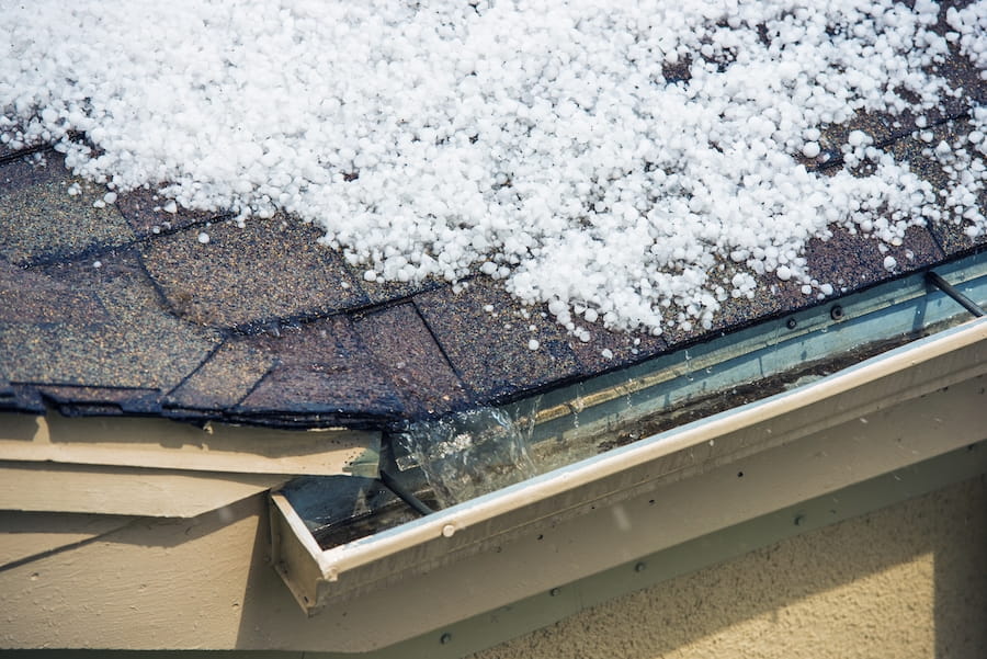 Discover how clogged gutters can destroy your roof