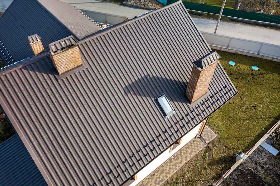 Durable metal roofing system installed to provide long-term protection for a home