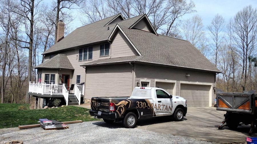 Roofing project in an Aurora lake community