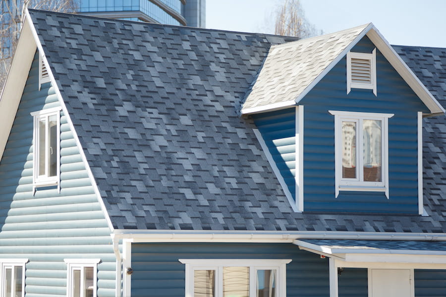 New Blue Home with Gray Shingled Roof