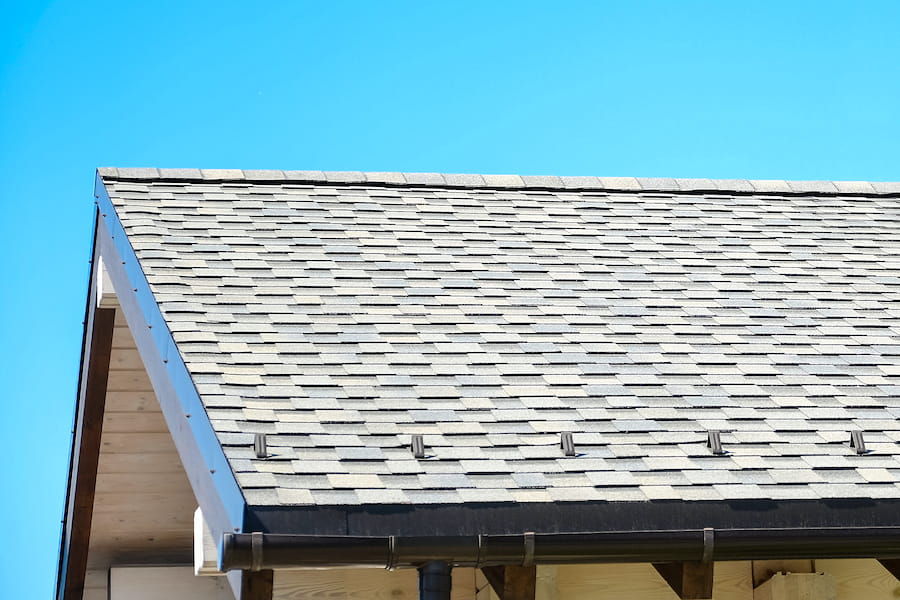 Rooftop View with Clear Blue Sky Above Home