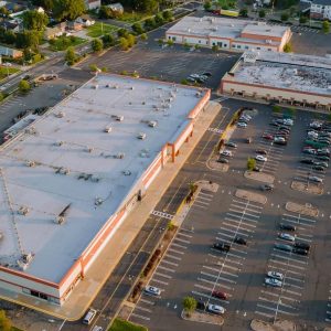 Commercial Roof Restoration Coatings Commercial building that needs roof restoration coating services.